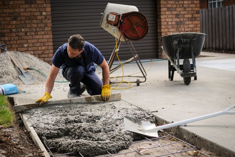 repairing a concrete surface by a concrete worker