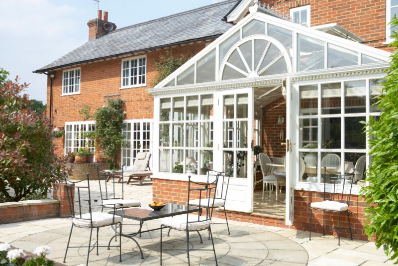 beautiful patio with seating area and plants