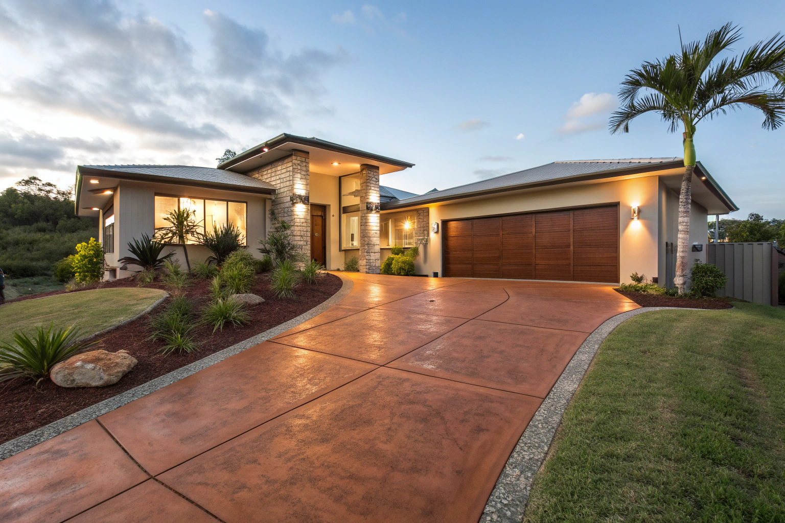 Modern Bundaberg home exterior with a finished concrete driveway